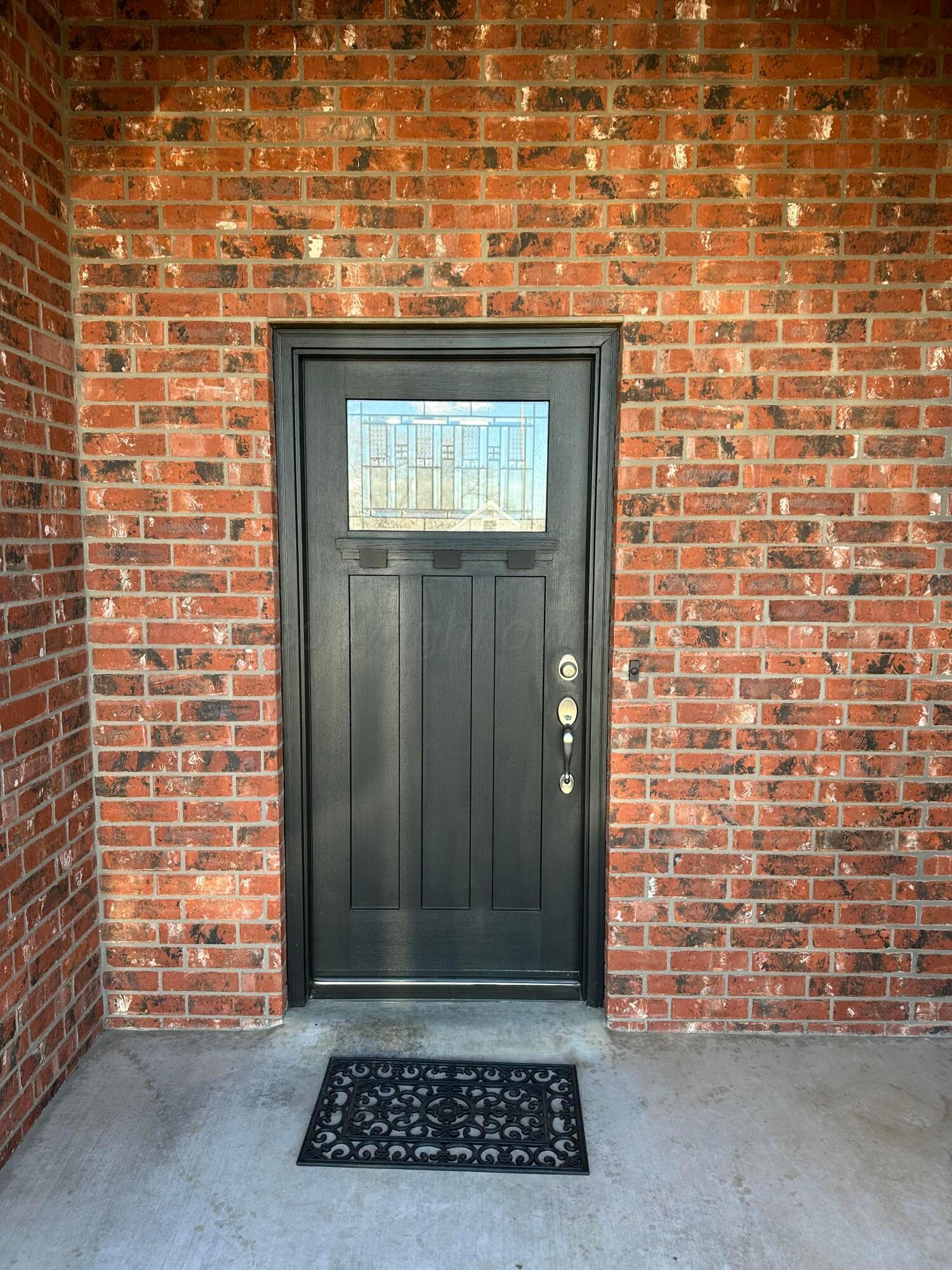 2 Cambridge Place Borger, TX 79007 - Photo 5 of 22 a view of a brick house with a door