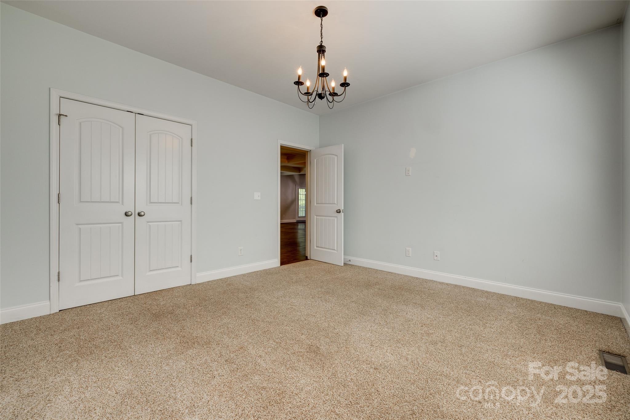 3243 Farmcrest Court Fort Mill, SC 29708 - Photo 17 of 45 a view of a chandelier in big room and chandelier