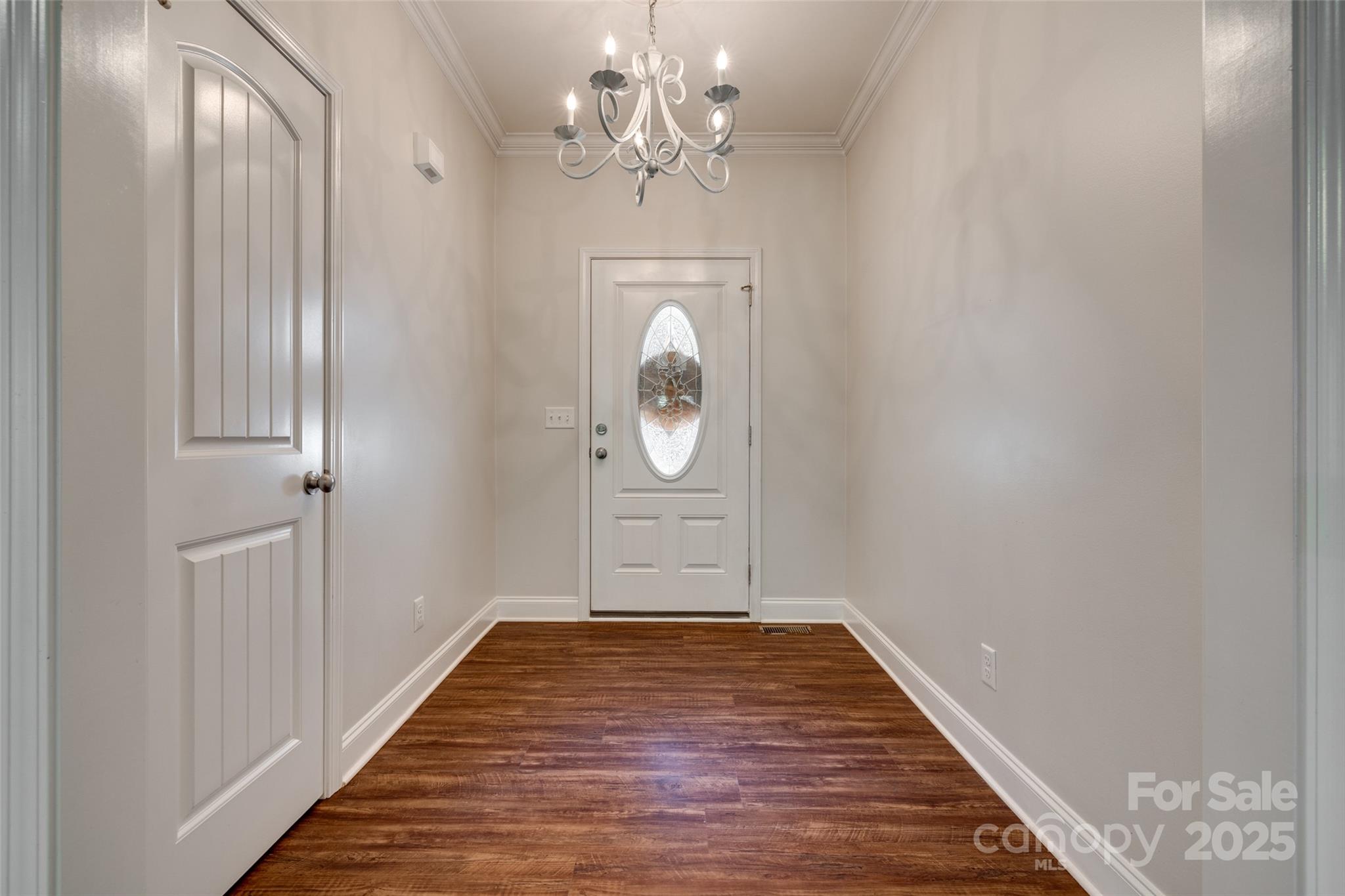 3243 Farmcrest Court Fort Mill, SC 29708 - Photo 2 of 45 a view of a hallway with wooden floor