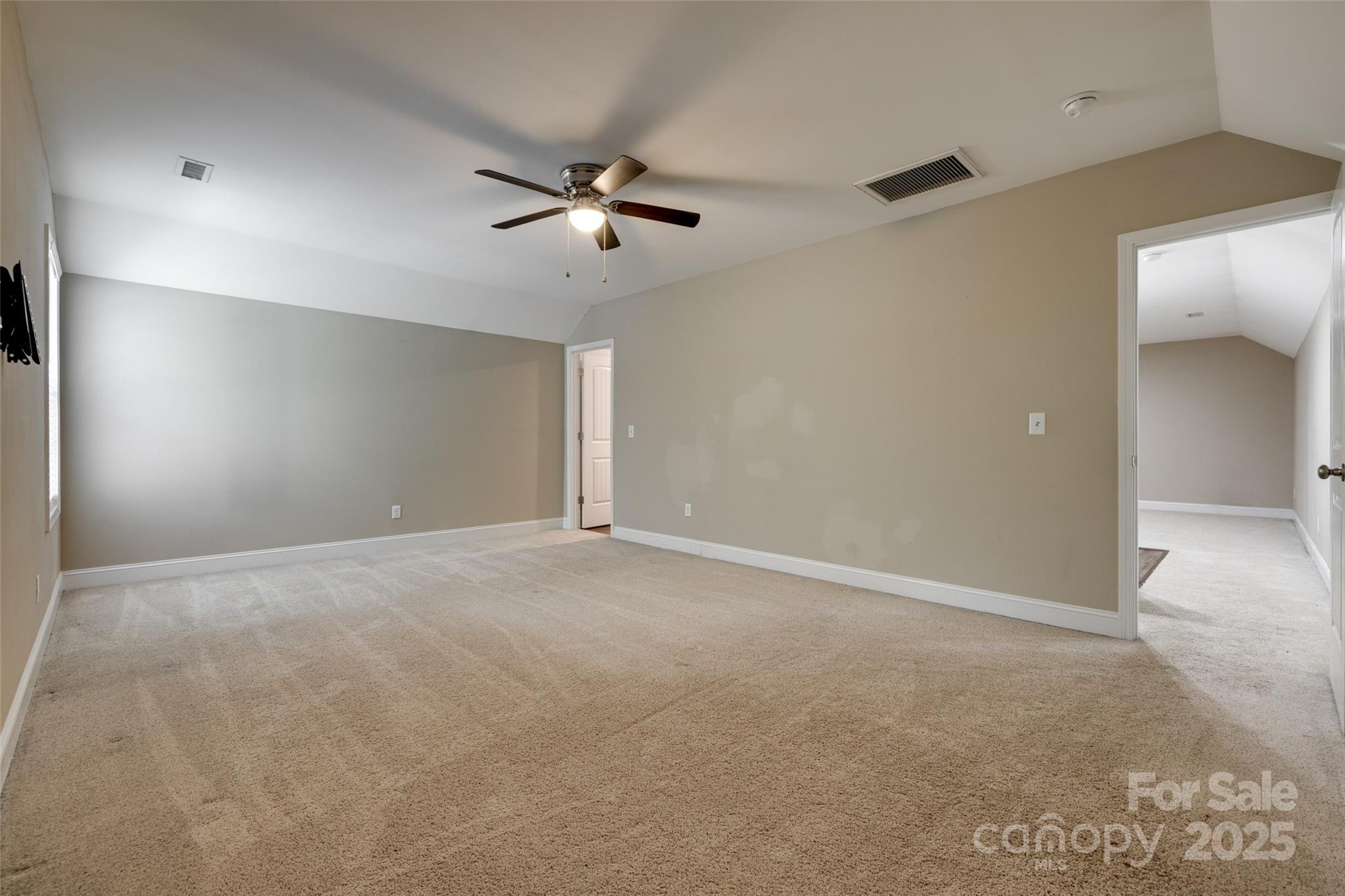 3243 Farmcrest Court Fort Mill, SC 29708 - Photo 29 of 45 a view of an empty room with a fan