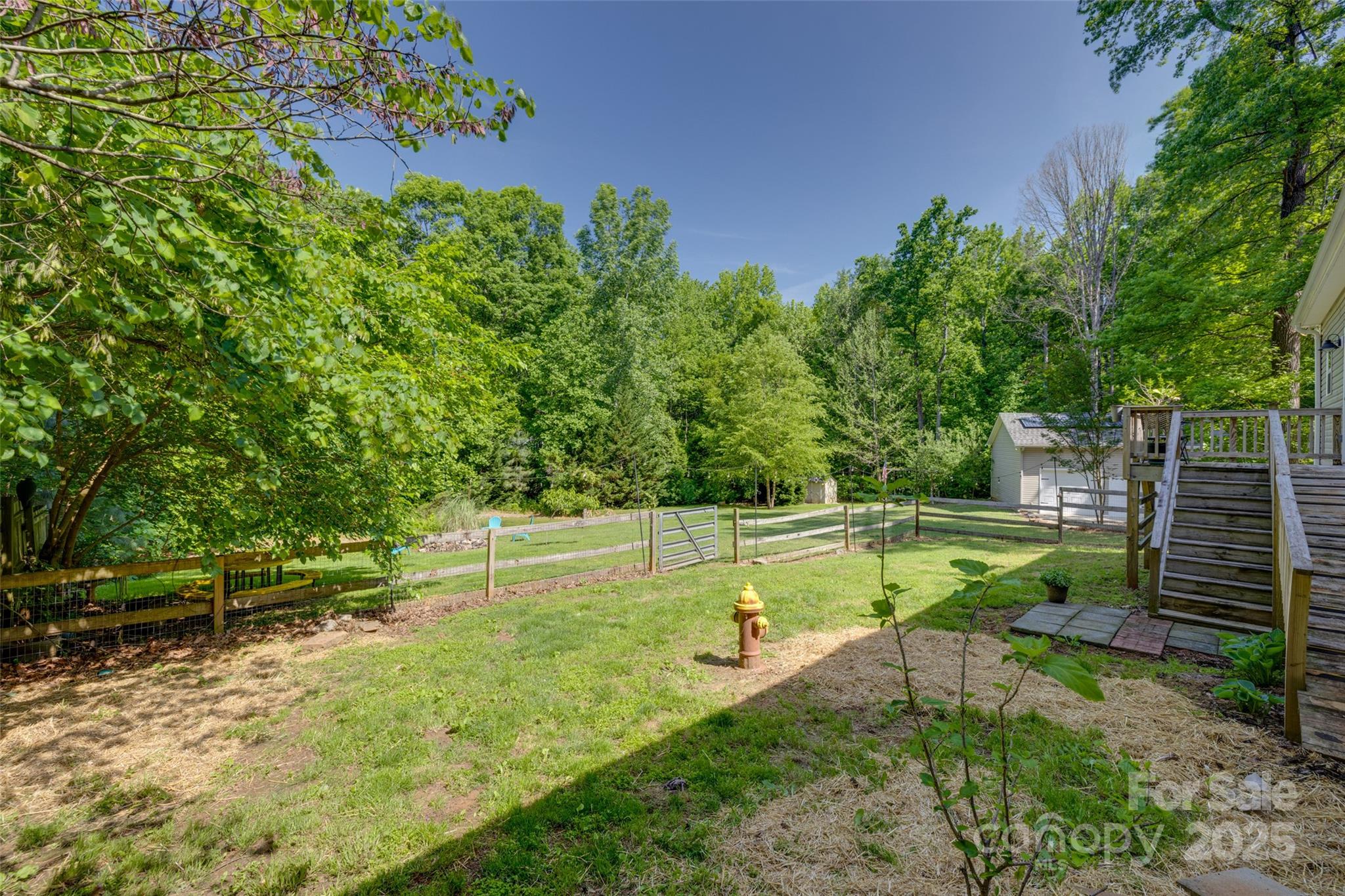 3243 Farmcrest Court Fort Mill, SC 29708 - Photo 32 of 45 a green field with lots of trees in it