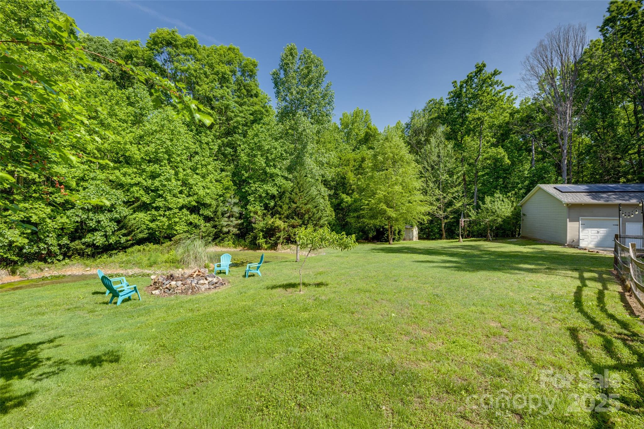 3243 Farmcrest Court Fort Mill, SC 29708 - Photo 33 of 45 a view of a backyard with a bench