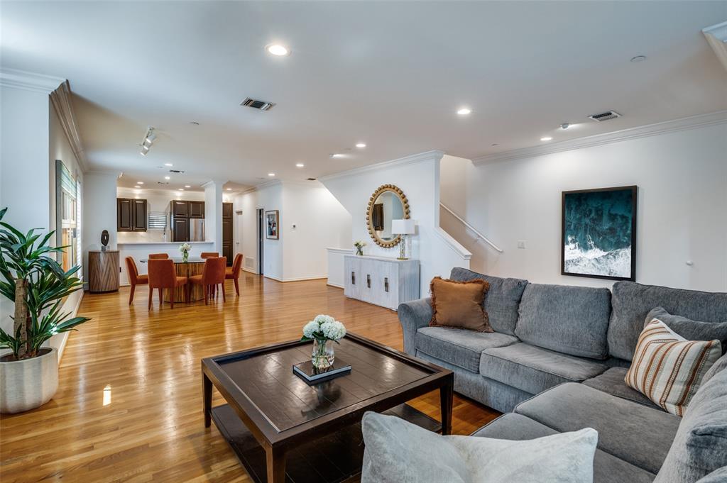 4223 Buena Vista Street, Unit 1 Dallas, TX 75205 - Photo 1 of 22 a living room with furniture and a wooden floor