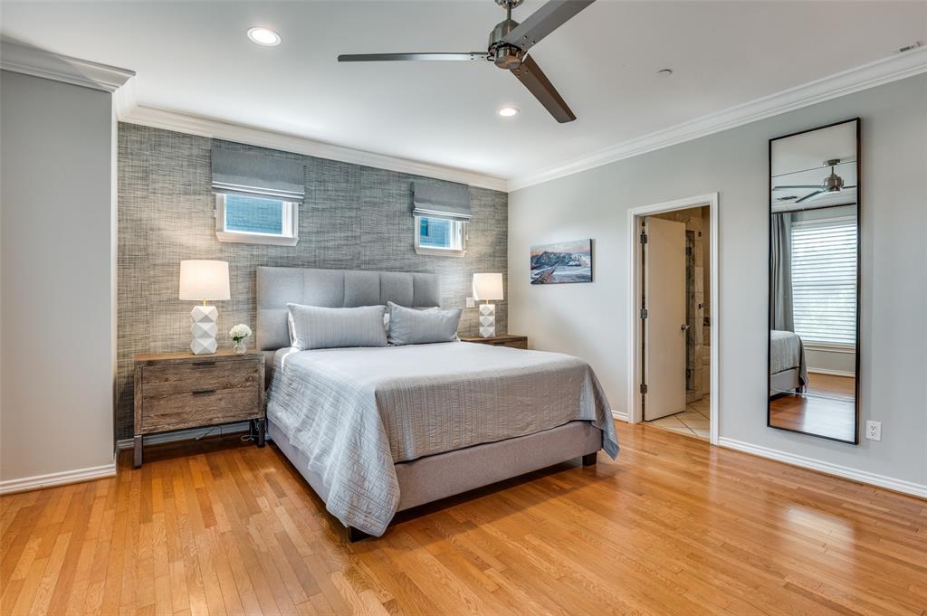 4223 Buena Vista Street, Unit 1 Dallas, TX 75205 - Photo 11 of 22 a bedroom with a bed and window