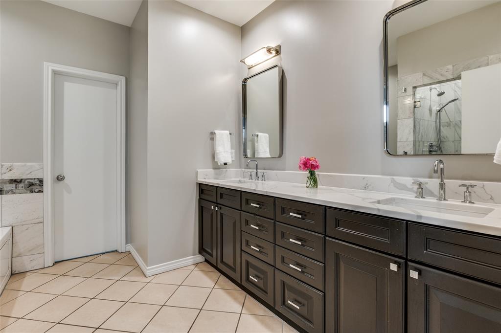 4223 Buena Vista Street, Unit 1 Dallas, TX 75205 - Photo 13 of 22 a bathroom with a double vanity sink mirror and double