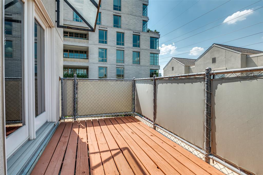 4223 Buena Vista Street, Unit 1 Dallas, TX 75205 - Photo 20 of 22 a view of balcony with wooden floor