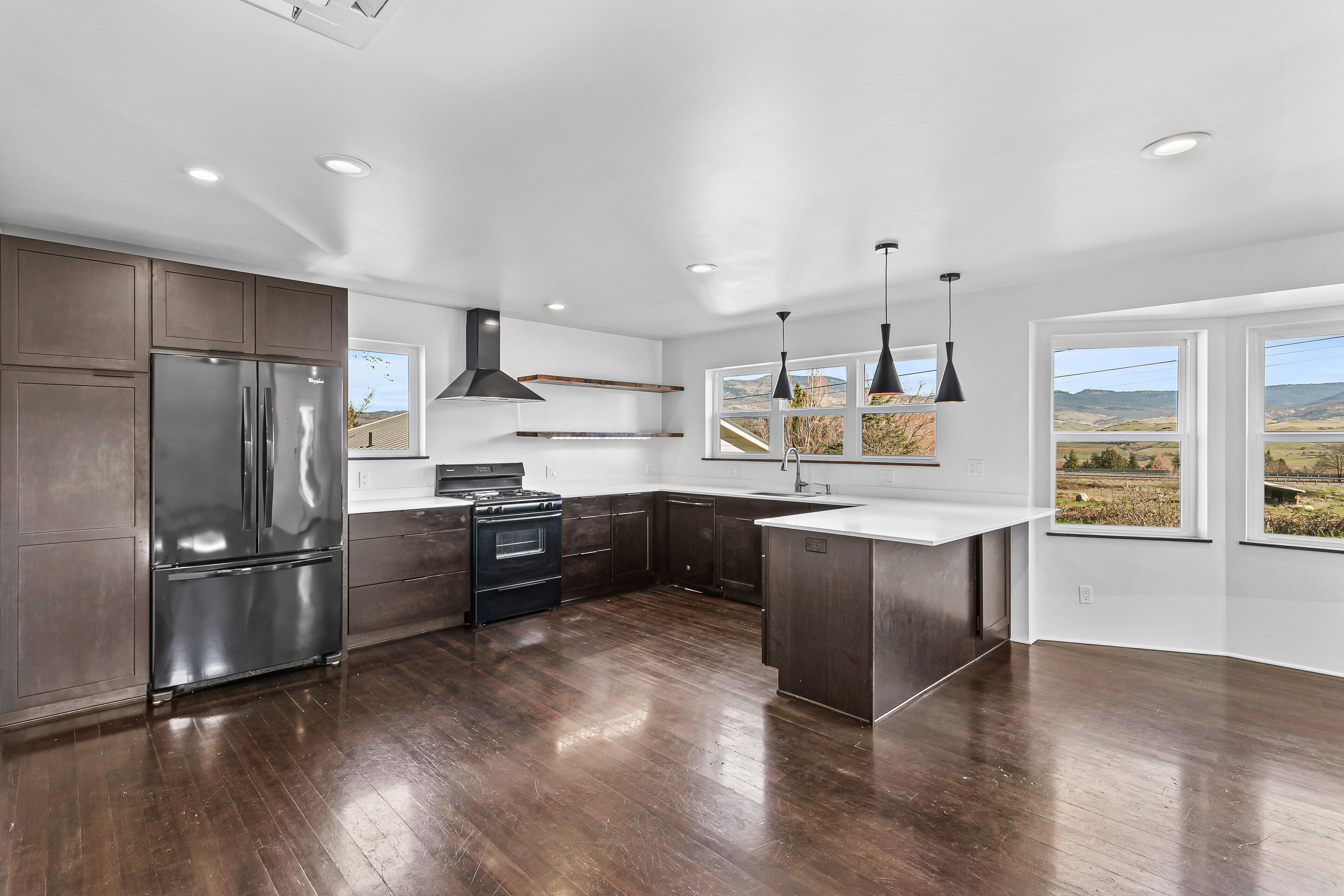 593 Crowson Road Ashland, OR 97520 - Photo 5 of 36 a kitchen with stainless steel appliances granite countertop a refrigerator a sink dishwasher a stove and a refrigerator