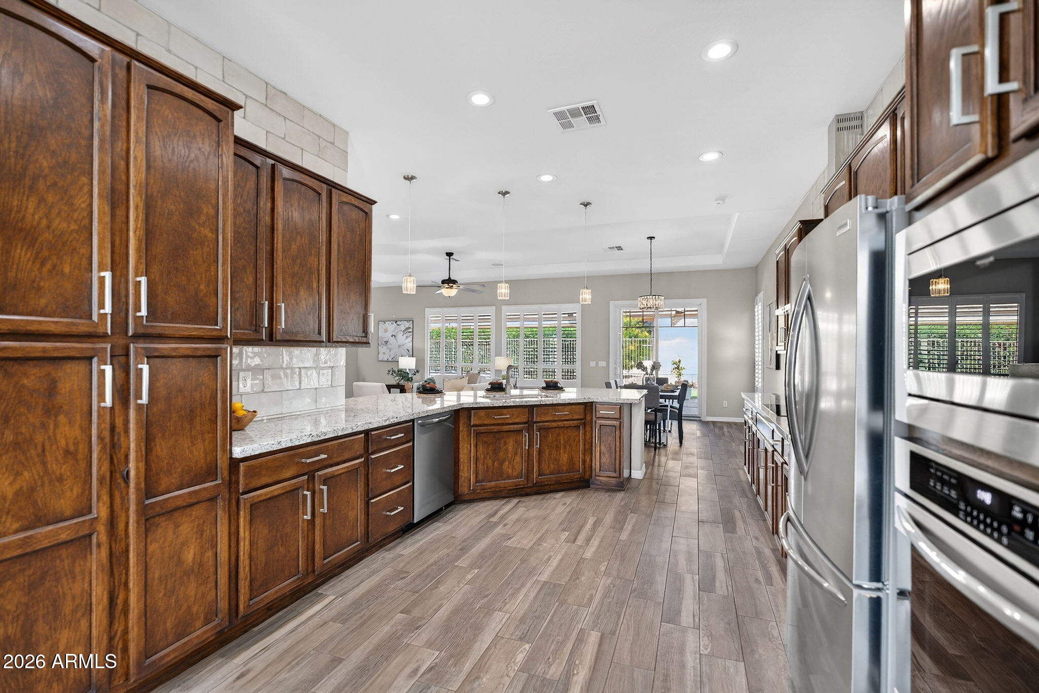 4128 East Jude Lane Gilbert, AZ 85298 - Photo 11 of 58 a kitchen with lots of counter top space and appliances