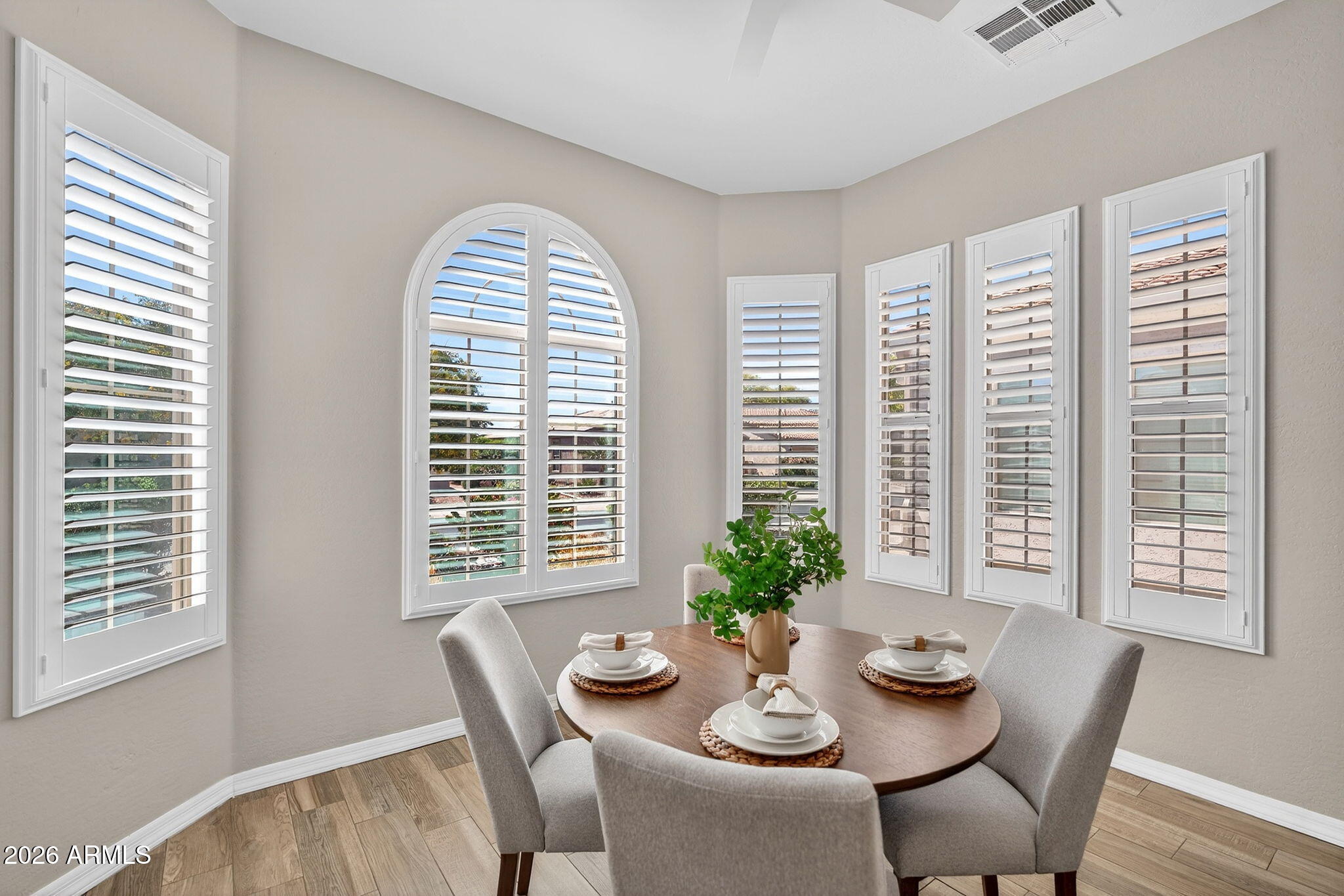 4128 East Jude Lane Gilbert, AZ 85298 - Photo 17 of 58 a view of a dining room with furniture and window