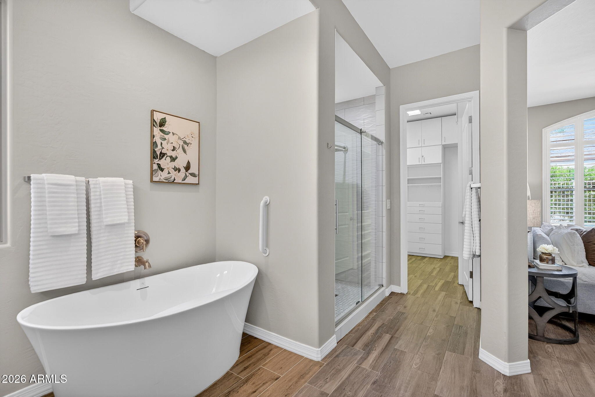 4128 East Jude Lane Gilbert, AZ 85298 - Photo 28 of 58 a bathroom with a white tub shower