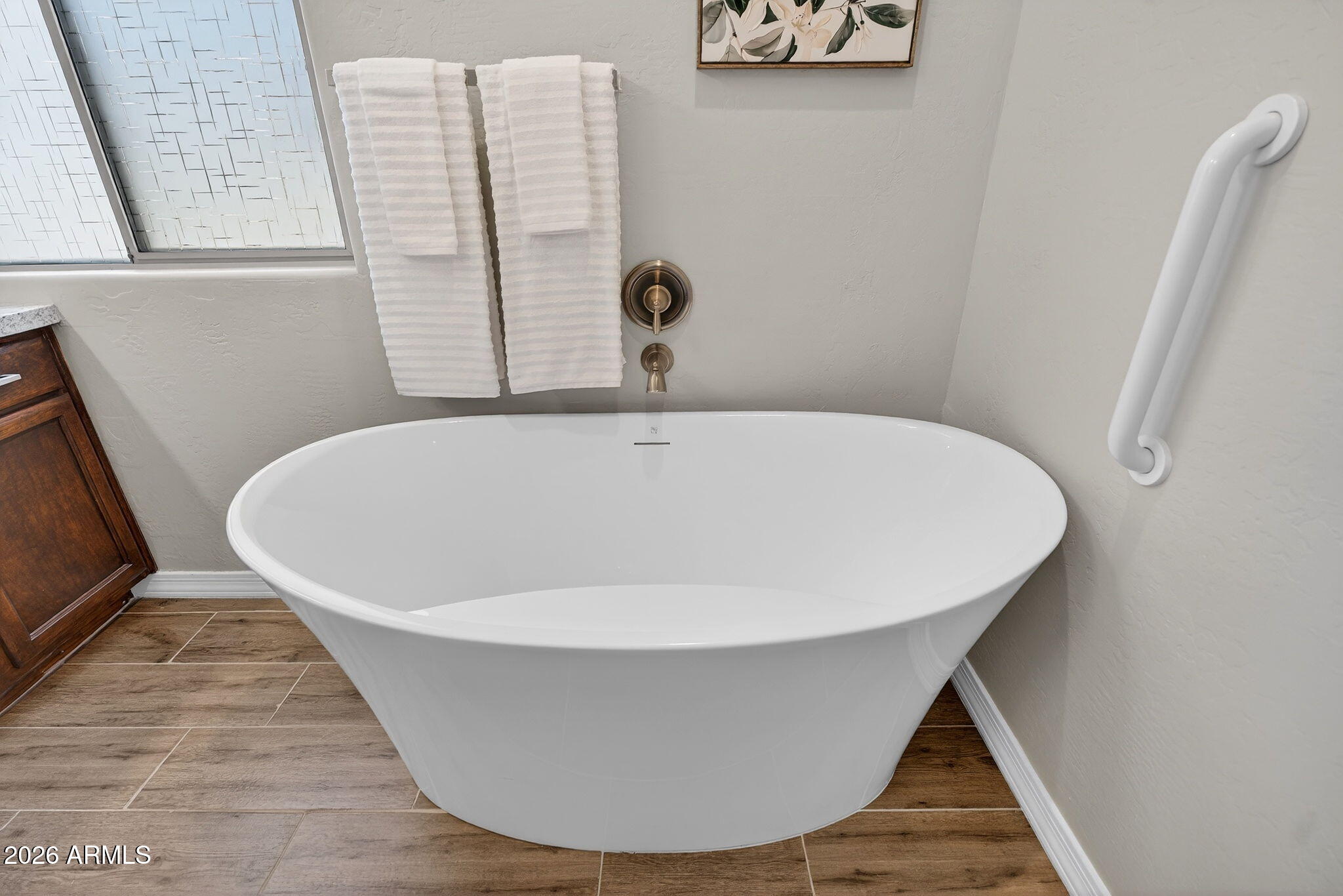4128 East Jude Lane Gilbert, AZ 85298 - Photo 30 of 58 a view of a bathtub in a bathroom