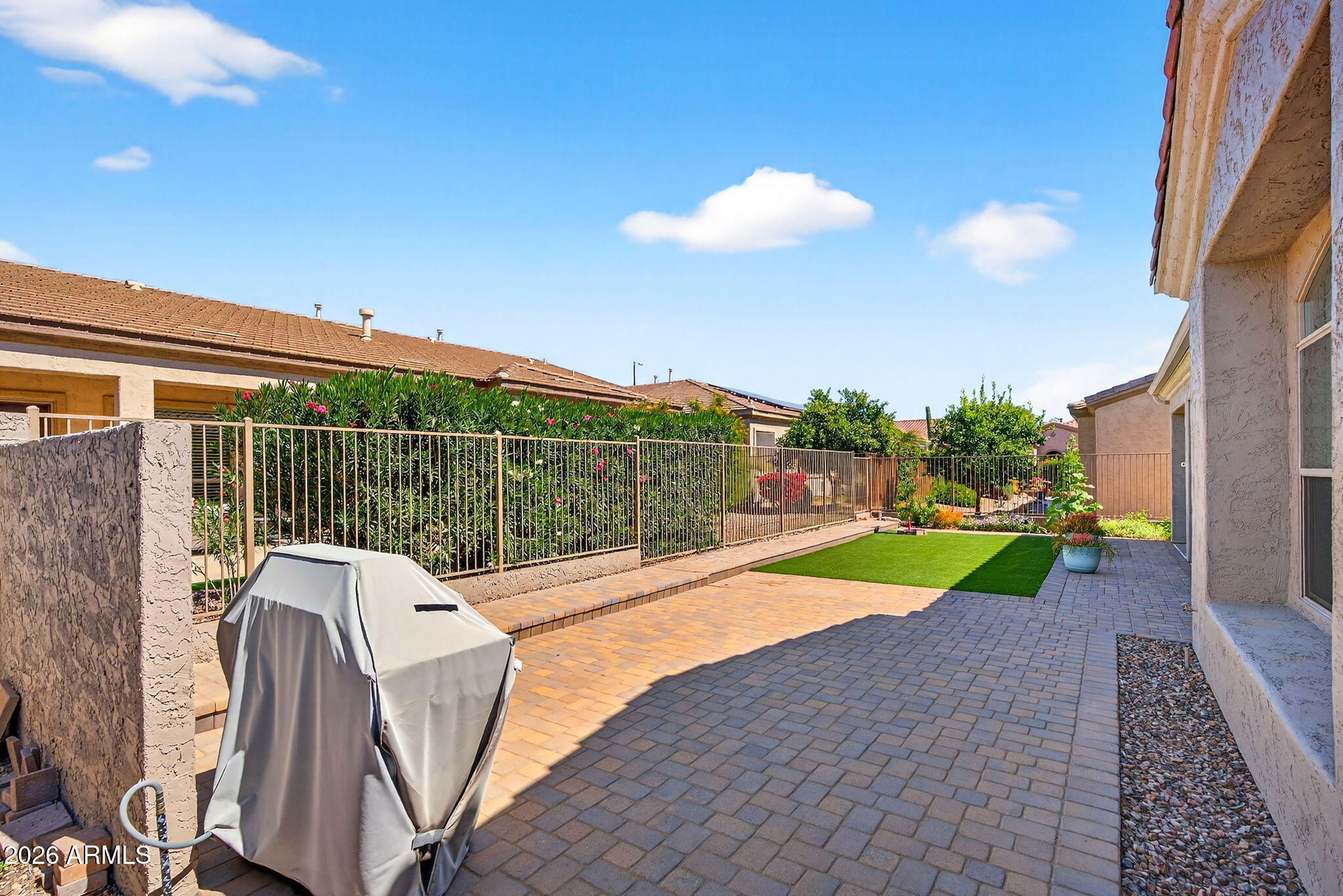 4128 East Jude Lane Gilbert, AZ 85298 - Photo 39 of 58 a view of a backyard with sitting area