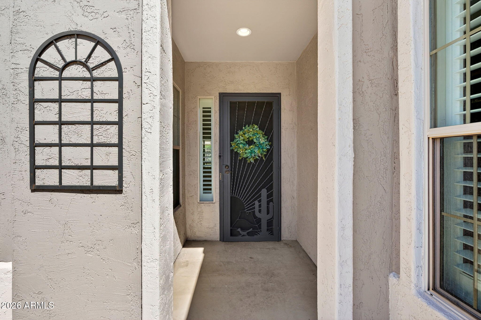 4128 East Jude Lane Gilbert, AZ 85298 - Photo 3 of 58 a view of entryway with a front door and wooden floor