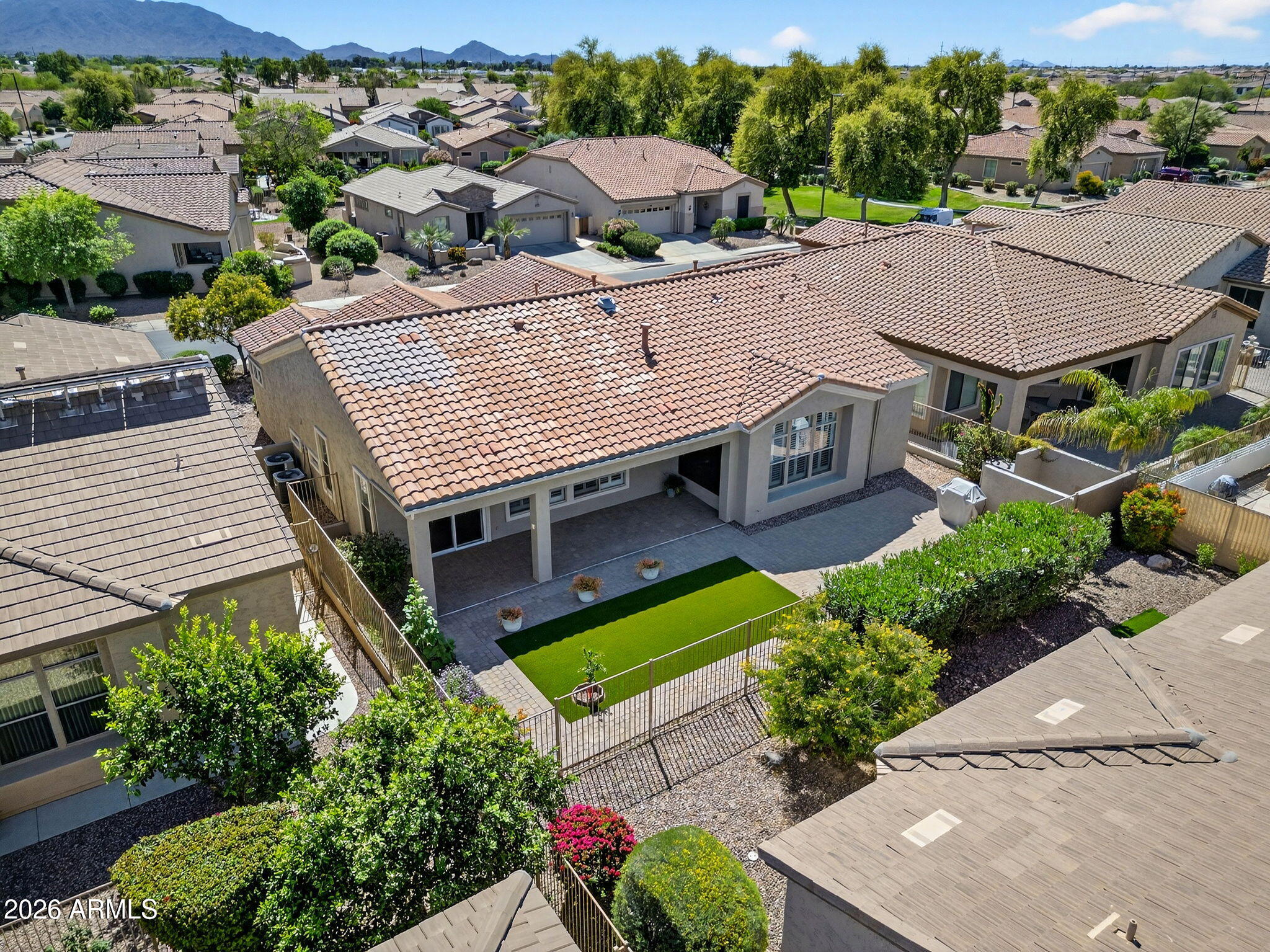 4128 East Jude Lane Gilbert, AZ 85298 - Photo 46 of 58 an aerial view of a house with a yard and potted plants