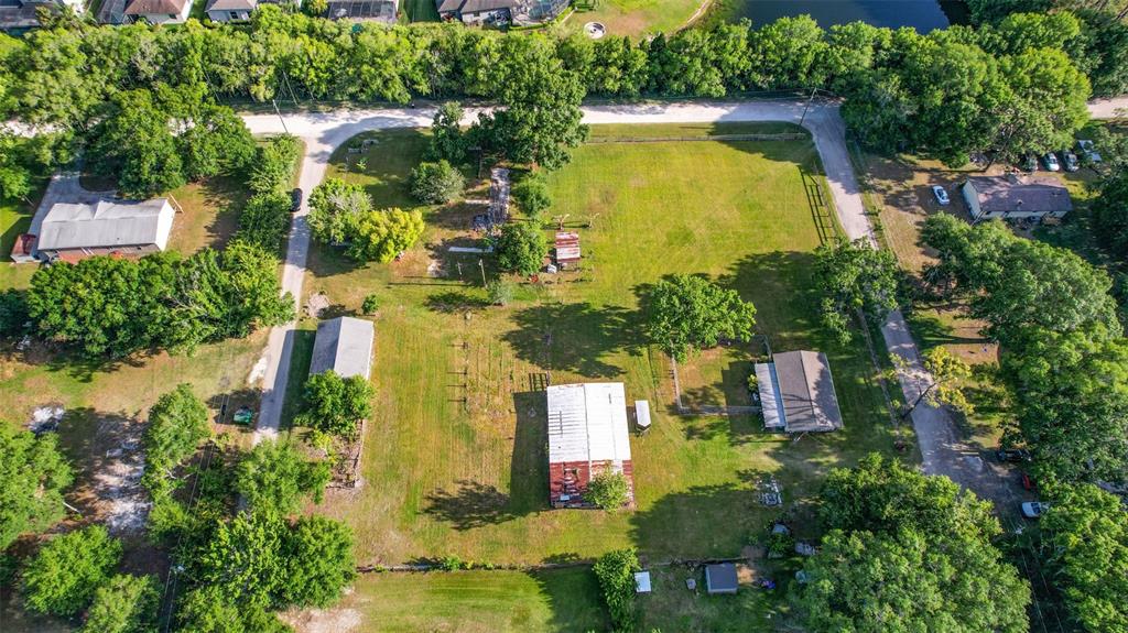 1747 Anna Road Odessa, FL 33556 - Photo 11 of 19 an aerial view of a house with a yard swimming pool and outdoor seating