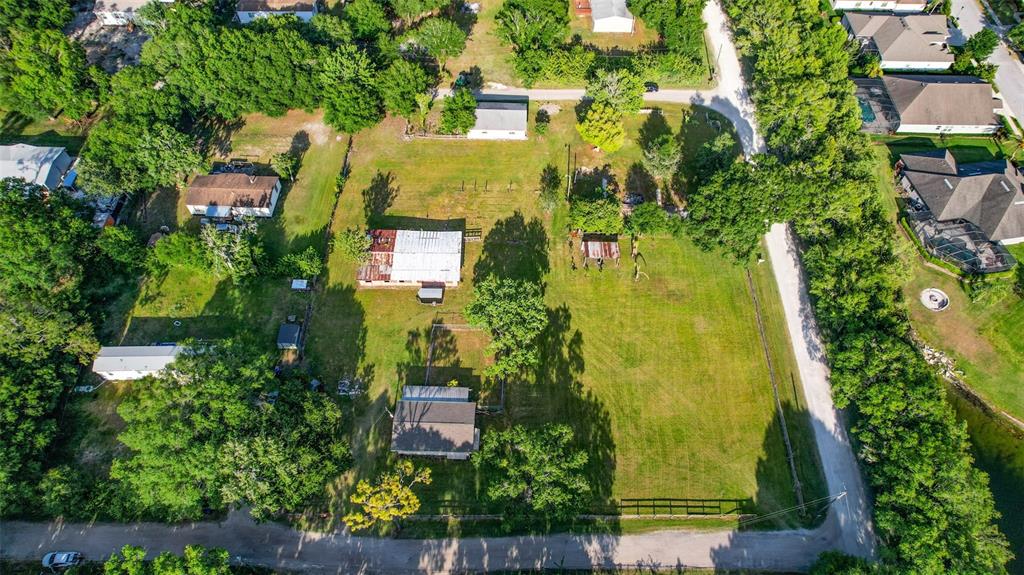 1747 Anna Road Odessa, FL 33556 - Photo 13 of 19 an aerial view of residential houses with yard