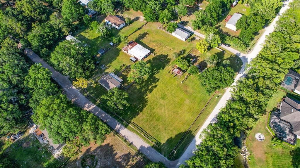 1747 Anna Road Odessa, FL 33556 - Photo 14 of 19 an aerial view of residential houses with yard