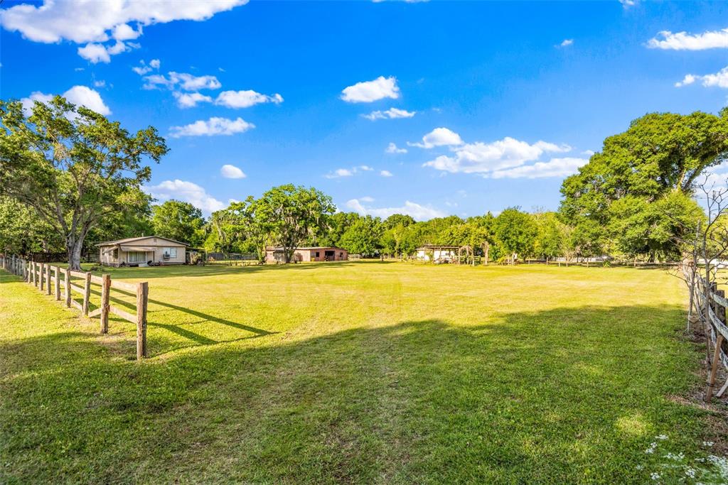 1747 Anna Road Odessa, FL 33556 - Photo 2 of 19 a view of an outdoor space and swimming pool