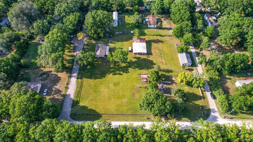 1747 Anna Road Odessa, FL 33556 - Photo 7 of 19 an aerial view of residential house with outdoor space and trees all around