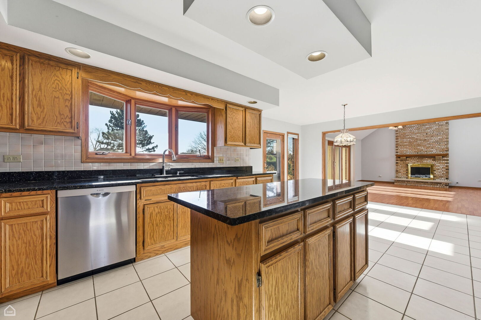 13725 Kit Lane Lemont, IL 60439 - Photo 13 of 61 a kitchen with granite countertop a sink and a counter