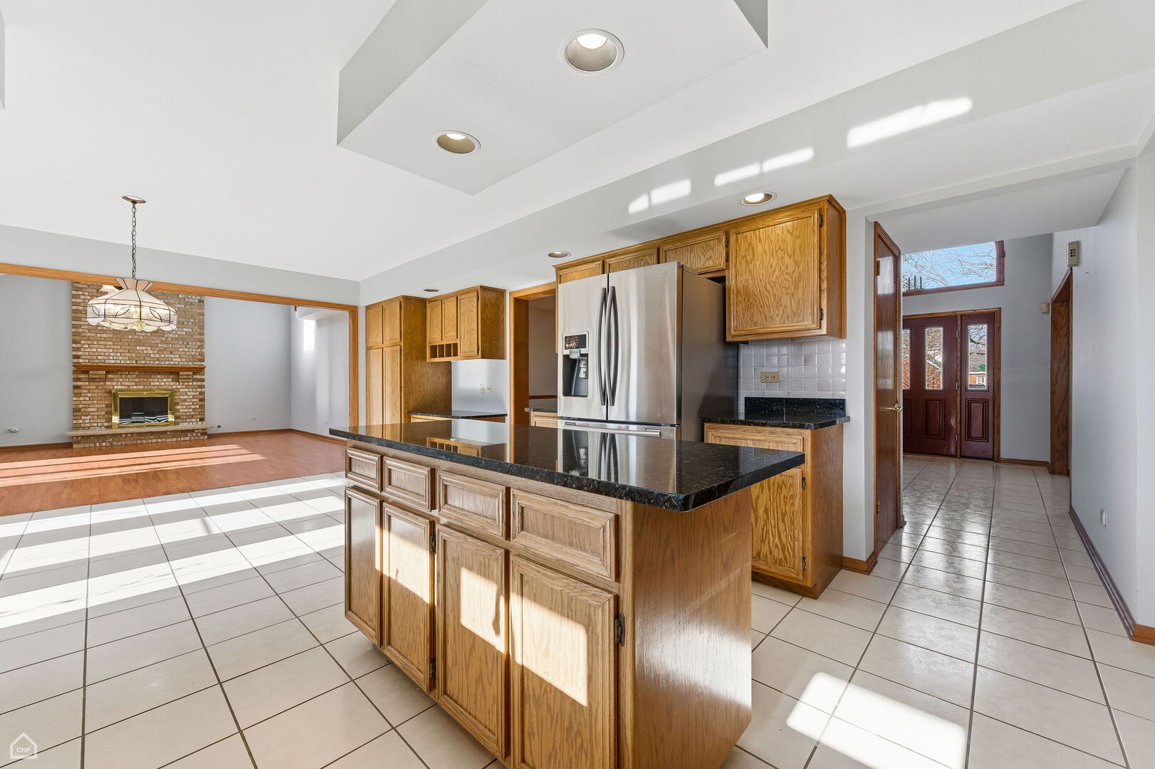 13725 Kit Lane Lemont, IL 60439 - Photo 14 of 61 a kitchen with stainless steel appliances granite countertop a refrigerator and a stove