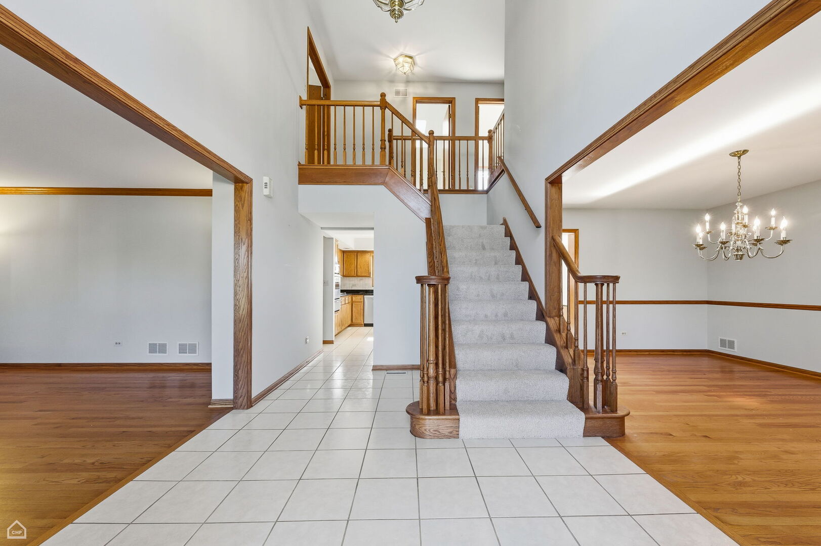 13725 Kit Lane Lemont, IL 60439 - Photo 2 of 61 a view of an entryway with wooden floor