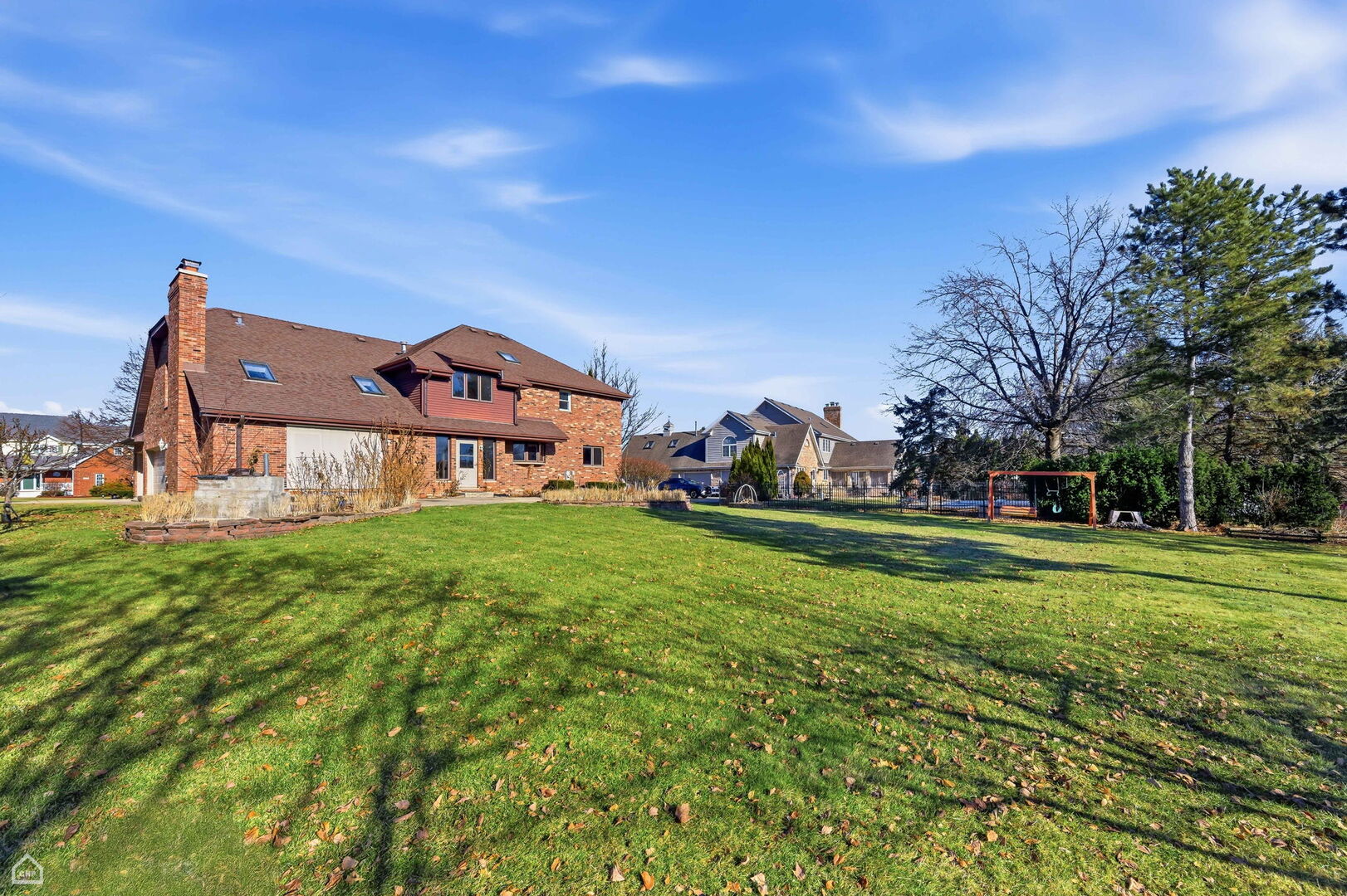 13725 Kit Lane Lemont, IL 60439 - Photo 22 of 61 a view of a big house with a big yard and large trees