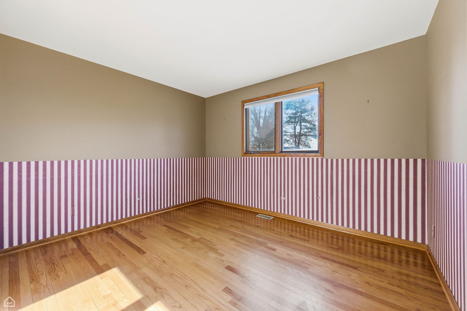 13725 Kit Lane Lemont, IL 60439 - Photo 46 of 61 a view of an empty room with wooden floor