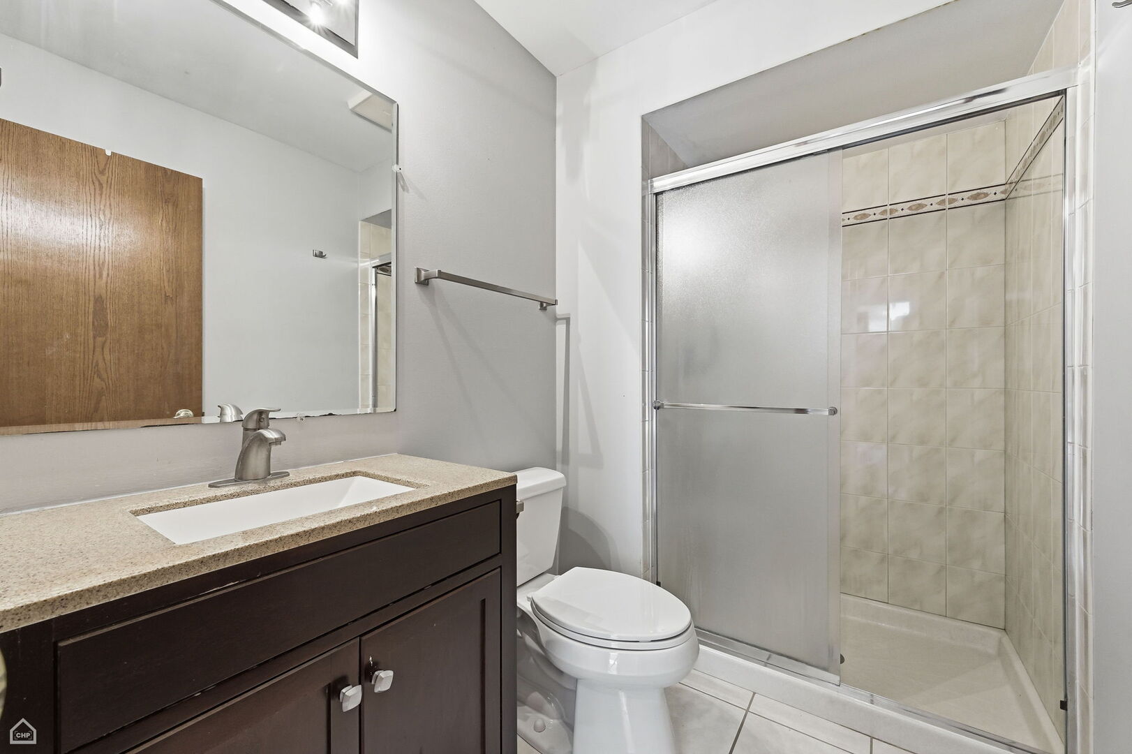 13725 Kit Lane Lemont, IL 60439 - Photo 48 of 61 a bathroom with a sink and a mirror