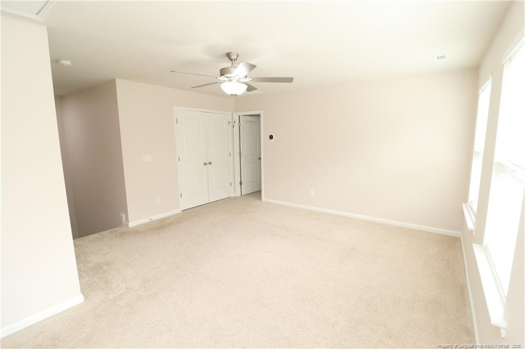 104 Kineton Woods Way Garner, NC 27529 - Photo 25 of 43 a view of an empty room