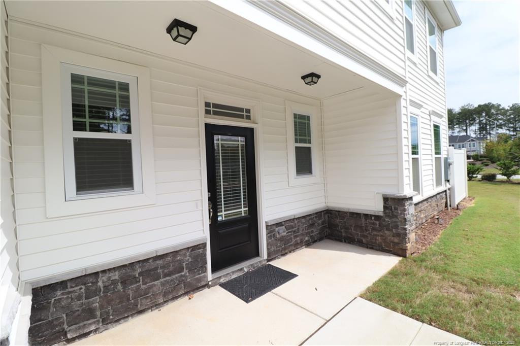 104 Kineton Woods Way Garner, NC 27529 - Photo 3 of 43 a view of a entryway of the house