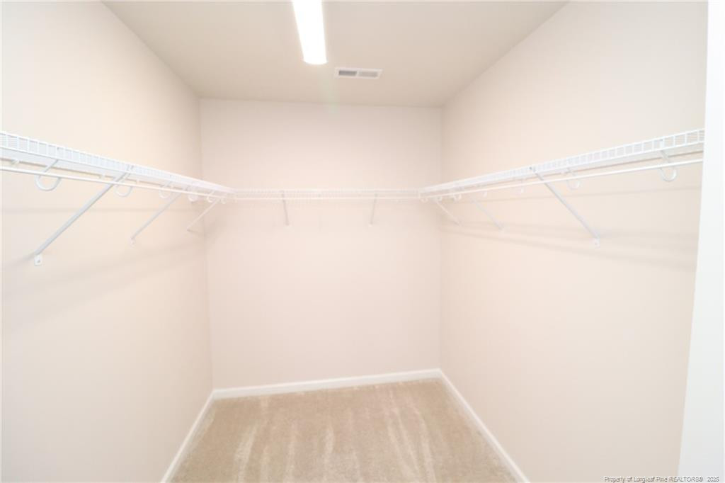 104 Kineton Woods Way Garner, NC 27529 - Photo 32 of 43 a view of small space with empty racks