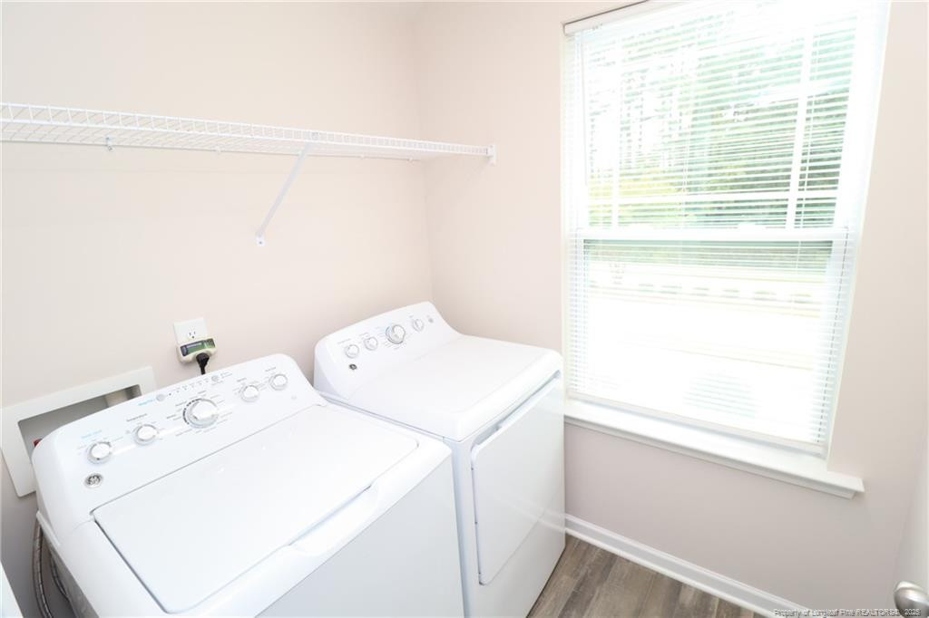 104 Kineton Woods Way Garner, NC 27529 - Photo 33 of 43 a utility room with dryer and washer