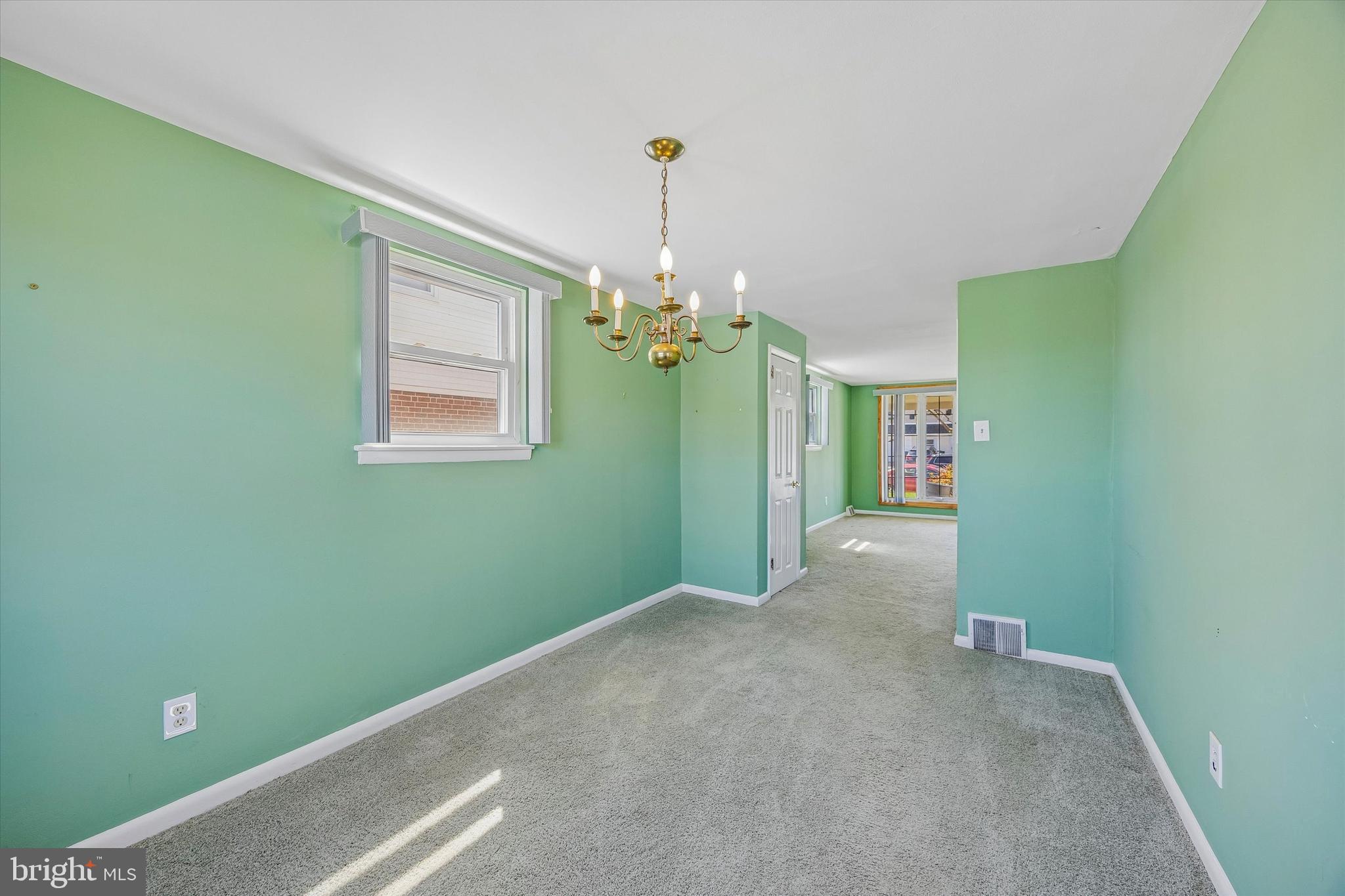 3527 Primrose Road Philadelphia, PA 19114 - Photo 4 of 25 a view of a room with window and chandelier
