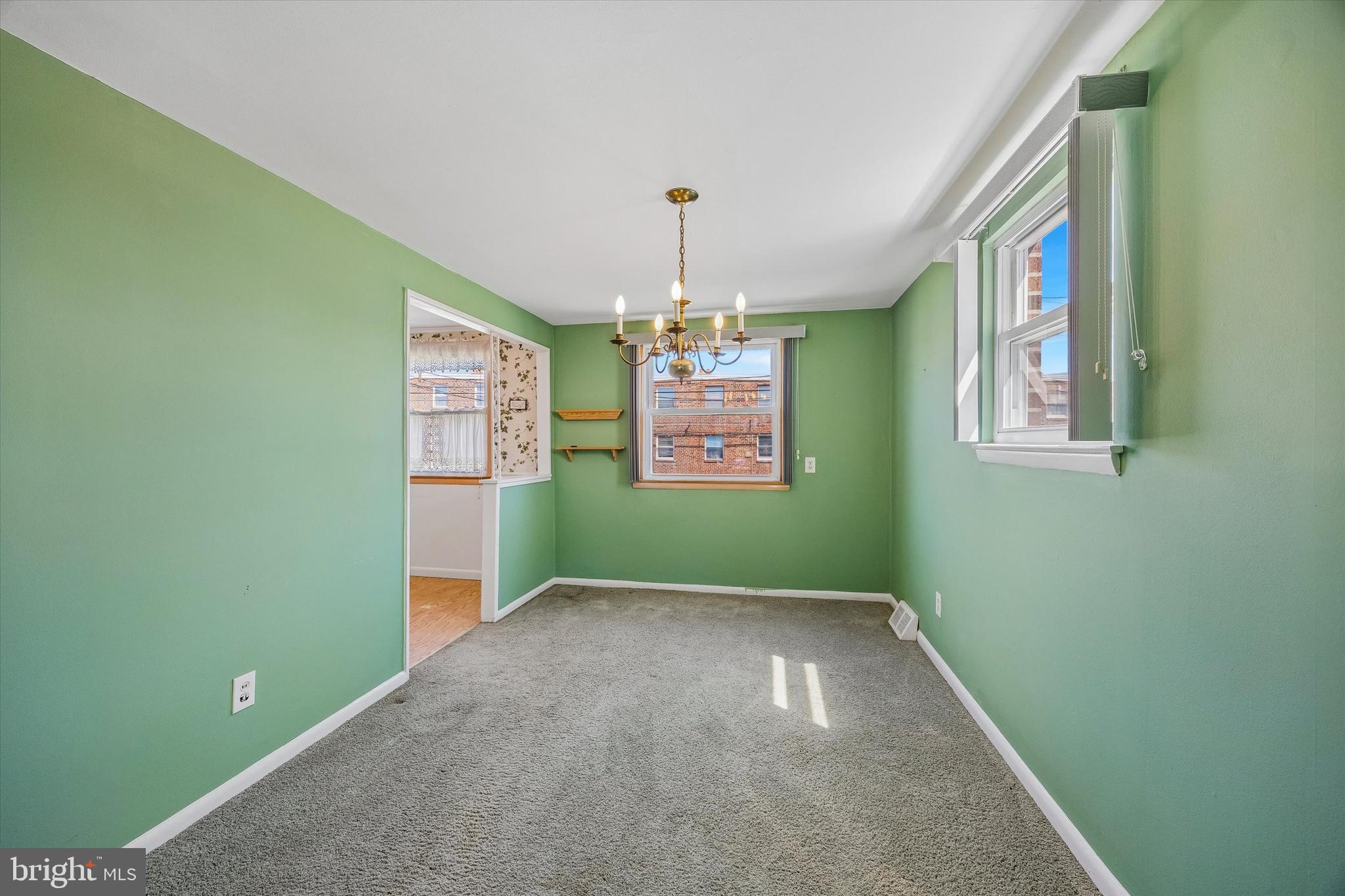 3527 Primrose Road Philadelphia, PA 19114 - Photo 5 of 25 a view of an empty room with window and chandelier