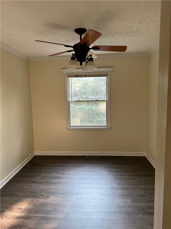 116 Franklin Hills Court Canton, GA 30114 - Photo 6 of 13 a view of room with wooden floor and fan