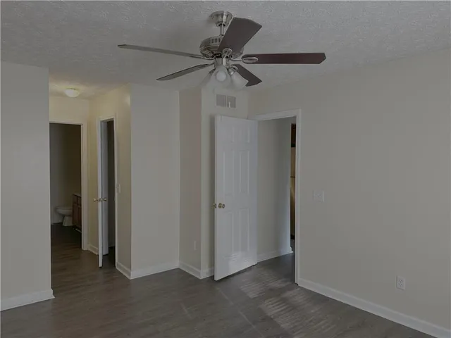 a view of a livingroom with a ceiling fan