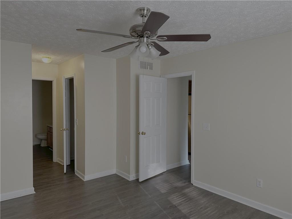 116 Franklin Hills Court Canton, GA 30114 - Photo 7 of 13 a view of a livingroom with a ceiling fan