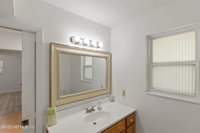 a view of a porch with wooden floor