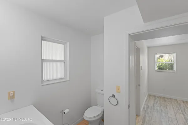 a view of yard with large trees