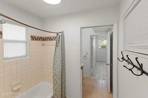 a house view with swimming pool