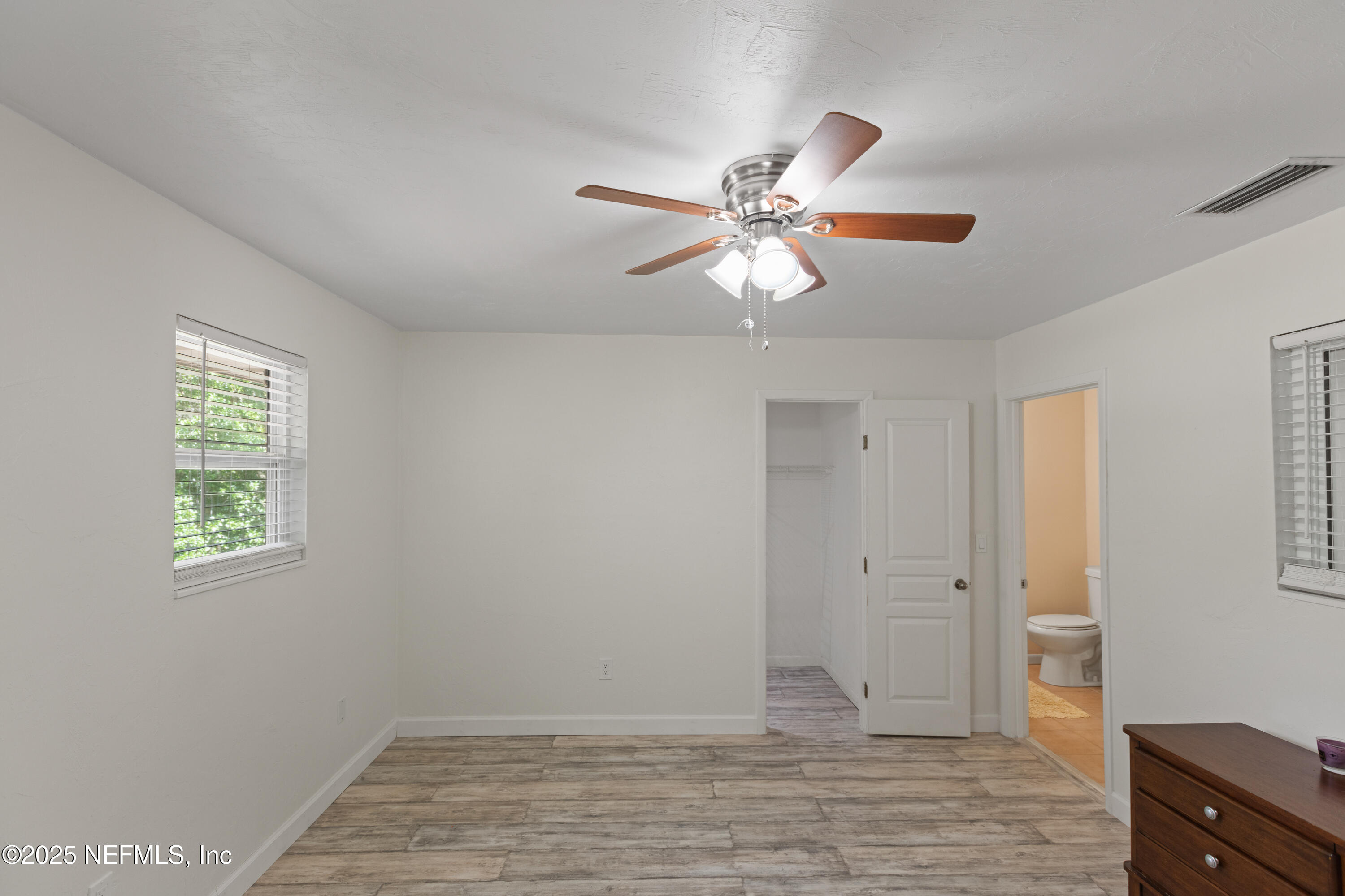 303 Southeast 3rd Avenue Melrose, FL 32666 - Photo 42 of 90 a view of an empty room with a window
