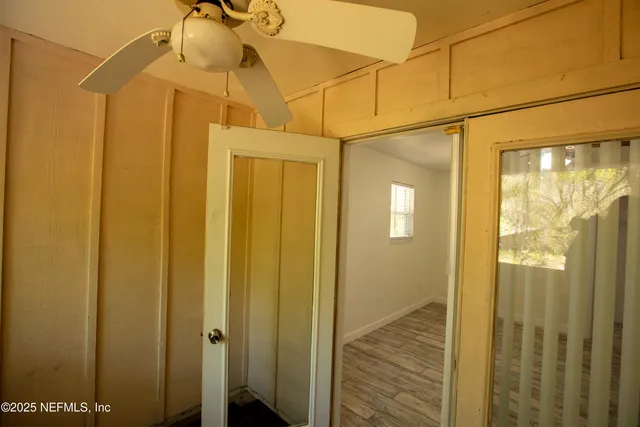 an aerial view of a house with a yard and garden