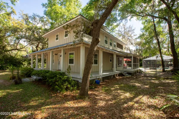 a view of a lake with a house
