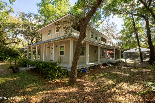 a view of a lake with a house