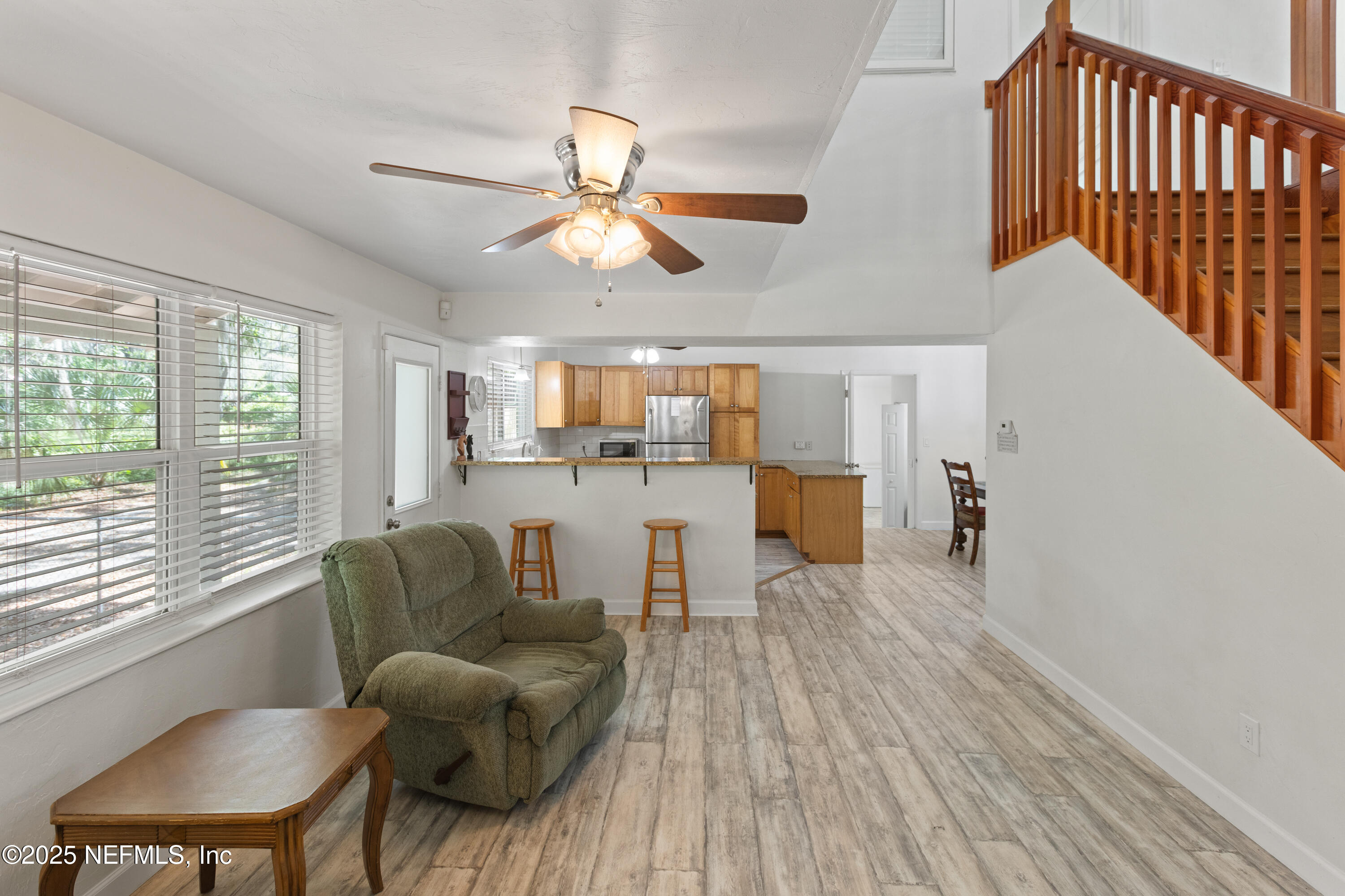 303 Southeast 3rd Avenue Melrose, FL 32666 - Photo 9 of 90 a living room with furniture and a large window