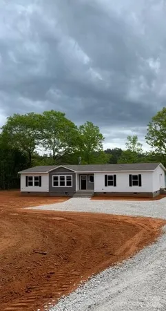 a view of a house with a big yard