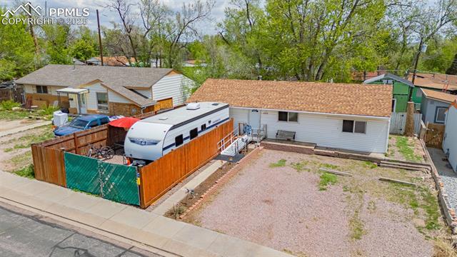 605 Huron Road Colorado Springs, CO 80910 - Photo 27 of 30 View of front of property with gravel driveway
