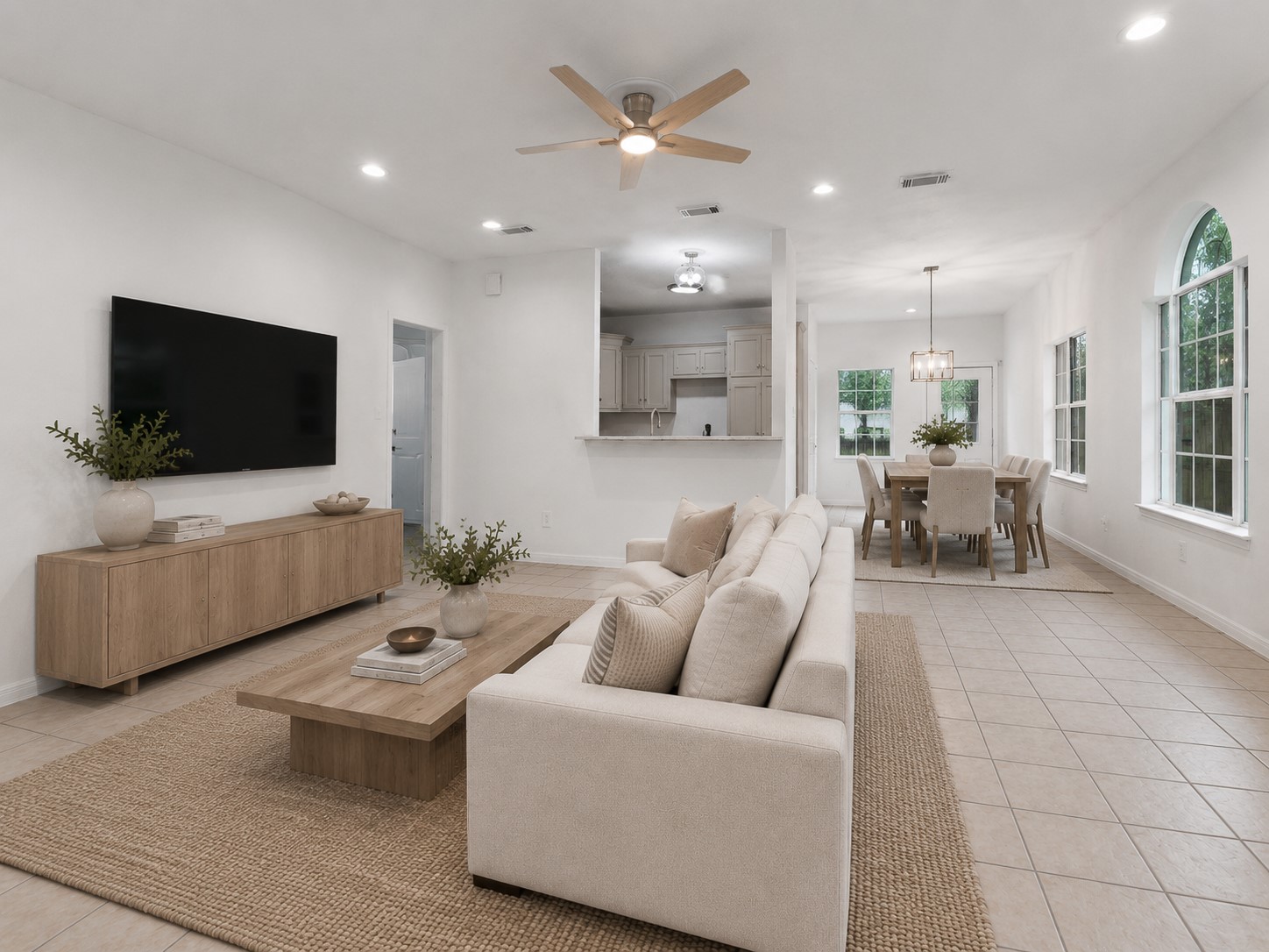 92 Tupelo Lane Conroe, TX 77304 - Photo 4 of 21 a living room with furniture and a flat screen tv