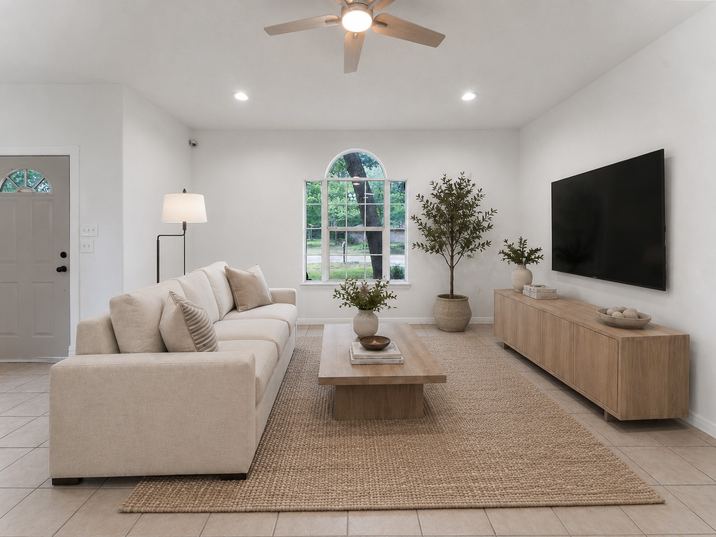 92 Tupelo Lane Conroe, TX 77304 - Photo 5 of 21 a living room with furniture and a flat screen tv